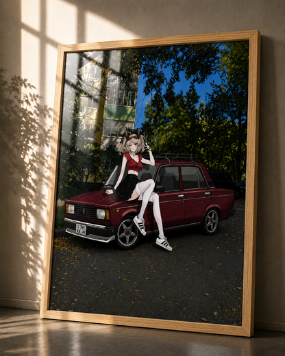 A framed art print leaning against a wall in a sunlit room. The print shows an anime-style woman sitting on a dark red vintage car outdoors, with trees, a building, and blue sky visible.